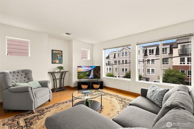 500 Aloha St Unit 202, Seattle, WA 98109 - living area featuring light wood finished floors and plenty of natural light