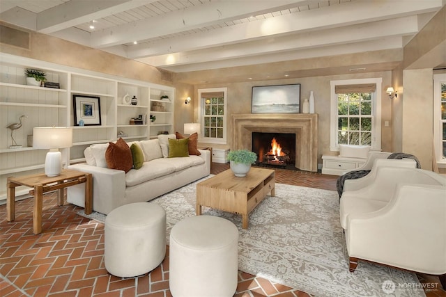1135 Evergreen Point Rd, Medina, WA 98039 - living area featuring a premium fireplace, brick floors, and a wood ceiling with exposed beams