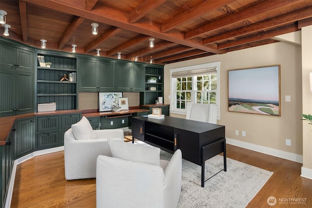 1135 Evergreen Point Rd, Medina, WA 98039 - office area with a wood ceiling with exposed beams, built in study area, and wood finished floors