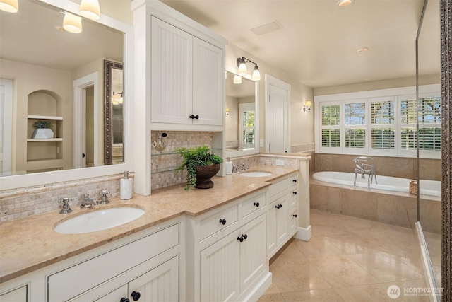 1135 Evergreen Point Rd, Medina, WA 98039 - bathroom with double vanity, a bath, decorative backsplash, and tile patterned flooring