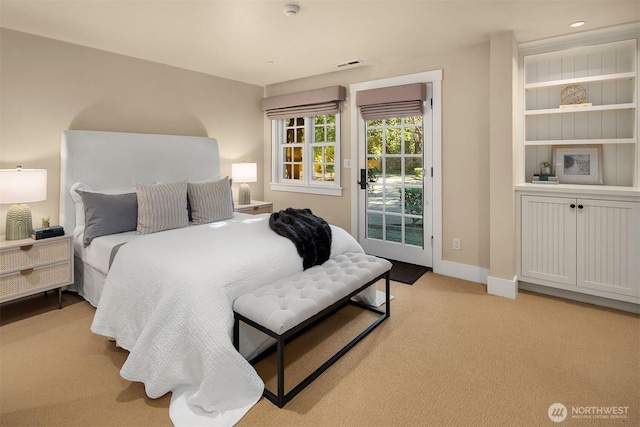 1135 Evergreen Point Rd, Medina, WA 98039 - bedroom with access to exterior and light colored carpet