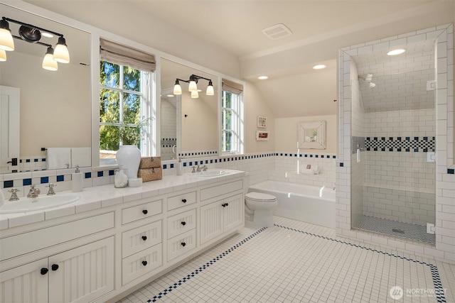 1135 Evergreen Point Rd, Medina, WA 98039 - bathroom featuring a garden tub, double vanity, a stall shower, tile patterned floors, and plenty of natural light