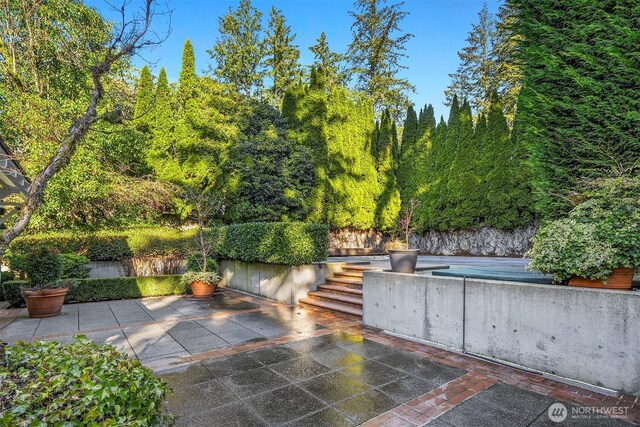 1135 Evergreen Point Rd, Medina, WA 98039 - view of patio / terrace featuring stairway