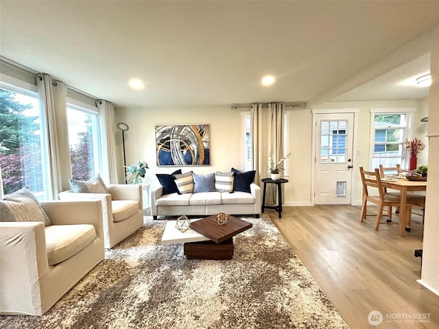 7353 29th Ave SW, Seattle, WA 98126 - living area with light wood-style flooring and recessed lighting