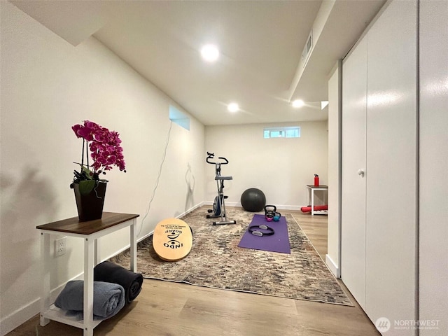 7353 29th Ave SW, Seattle, WA 98126 - workout room featuring wood finished floors and recessed lighting