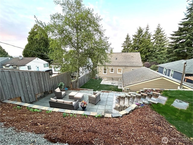 7353 29th Ave SW, Seattle, WA 98126 - back of house featuring a patio and outdoor lounge area