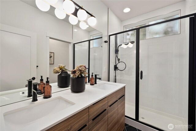 2439 NW 61st St Unit A, Seattle, WA 98107 - bathroom featuring plenty of natural light, a stall shower, and double vanity