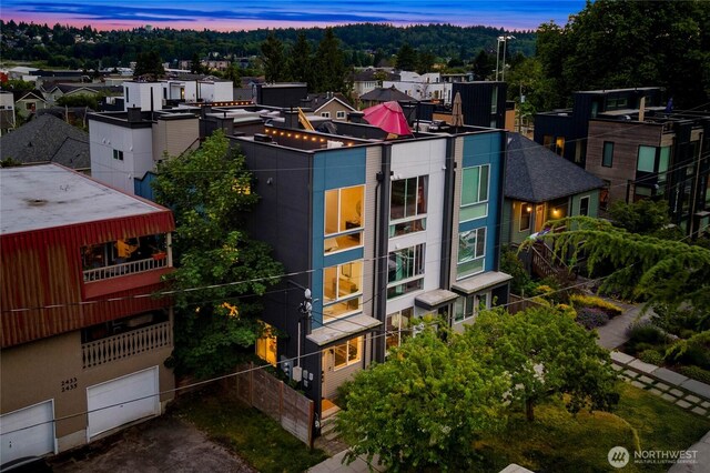 2439 NW 61st St Unit A, Seattle, WA 98107 - view of front facade featuring an attached garage and driveway