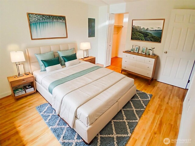 510 S 325th St Unit 19G, Federal Way, WA 98003 - bedroom with electric panel and wood finished floors