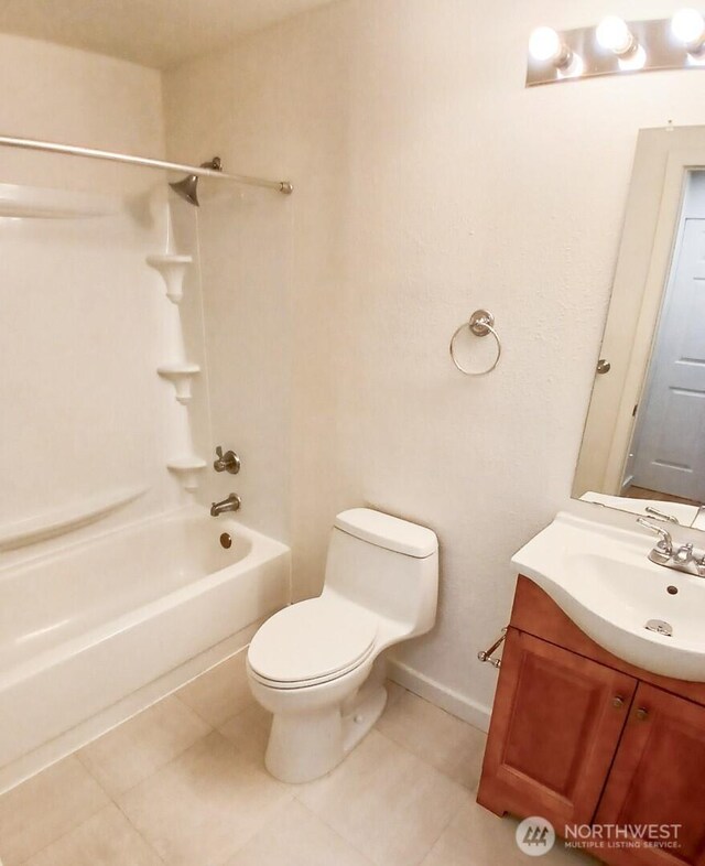 510 S 325th St Unit 19G, Federal Way, WA 98003 - bathroom featuring vanity, shower / washtub combination, and tile patterned floors