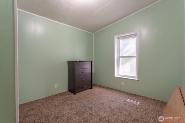 19412 Vantage Ln, Onalaska, WA 98570 - unfurnished bedroom featuring crown molding, carpet, lofted ceiling, and a textured ceiling