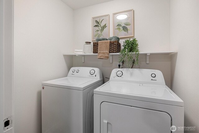 12718 NE 120th St Unit J-2, Kirkland, WA 98034 - washroom featuring washer and clothes dryer