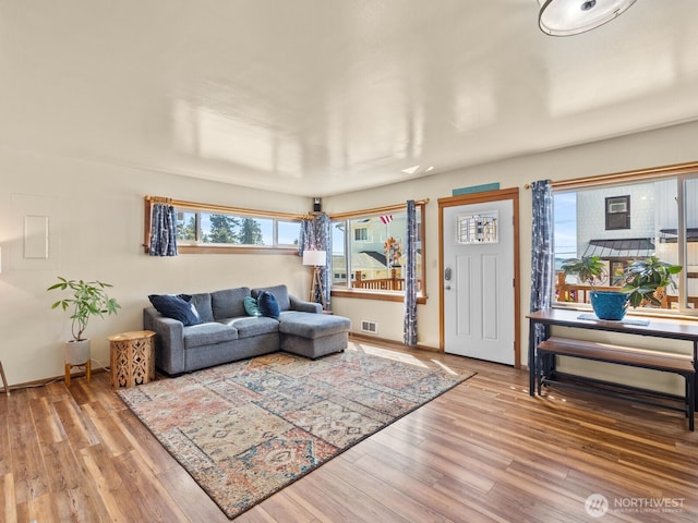 139 Maple St, Camano Island, WA 98282 - living area featuring wood finished floors and baseboards