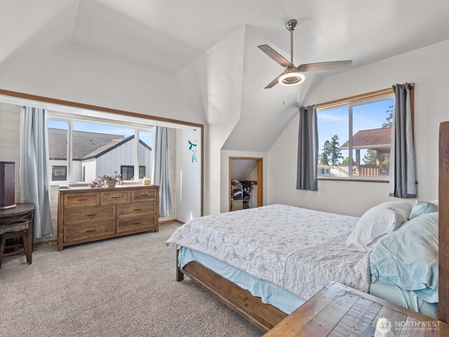 139 Maple St, Camano Island, WA 98282 - carpeted bedroom featuring vaulted ceiling and a ceiling fan