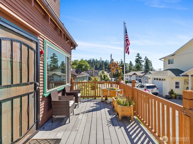 139 Maple St, Camano Island, WA 98282 - wooden deck featuring a residential view