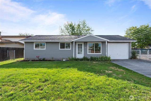 325 S 8th Ave, Othello, WA 99344 - ranch-style home featuring a garage, concrete driveway, and a shingled roof