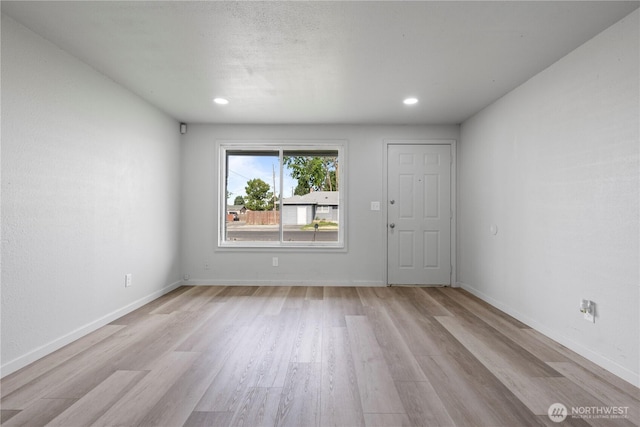 325 S 8th Ave, Othello, WA 99344 - foyer with light wood-style flooring and recessed lighting