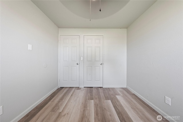325 S 8th Ave, Othello, WA 99344 - spare room featuring wood finished floors and baseboards