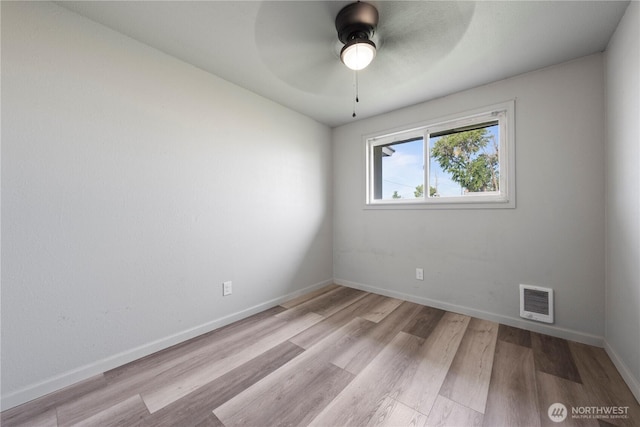 325 S 8th Ave, Othello, WA 99344 - spare room with wood finished floors and ceiling fan
