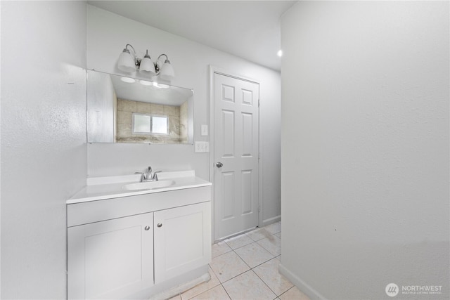 325 S 8th Ave, Othello, WA 99344 - bathroom with vanity and tile patterned flooring