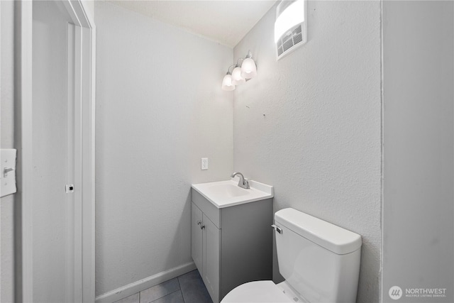 325 S 8th Ave, Othello, WA 99344 - half bathroom with vanity and tile patterned flooring