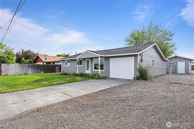 325 S 8th Ave, Othello, WA 99344 - single story home with a garage, concrete driveway, and board and batten siding