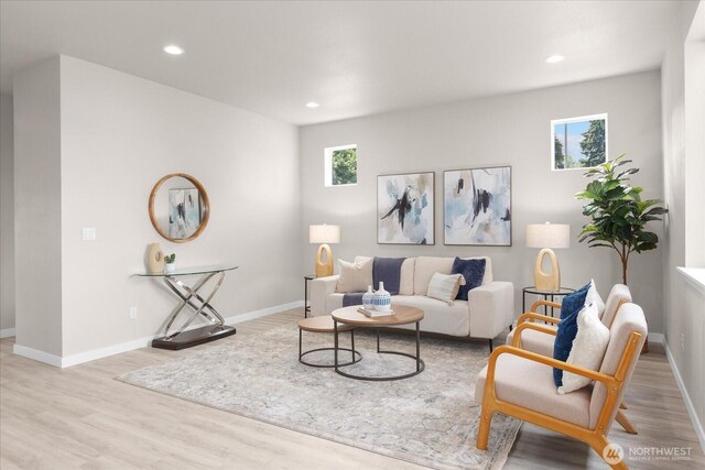 711 S 96th St, Tacoma, WA 98444 - living room featuring healthy amount of natural light, wood finished floors, and recessed lighting