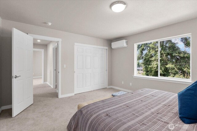 711 S 96th St, Tacoma, WA 98444 - carpeted bedroom with a wall unit AC and a closet