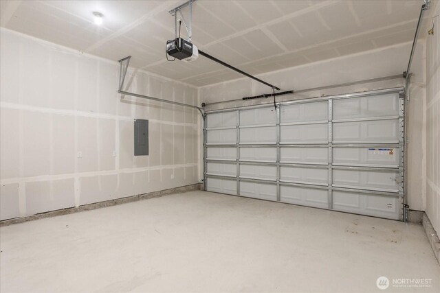 711 S 96th St, Tacoma, WA 98444 - garage with a garage door opener and electric panel
