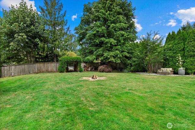 35632 158th St SE, Sultan, WA 98294 - fenced backyard featuring a fire pit