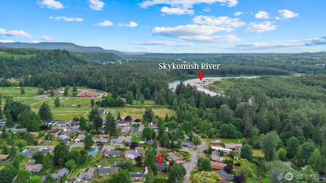 35632 158th St SE, Sultan, WA 98294 - aerial view of property and surrounding area with a heavily wooded area and mountains