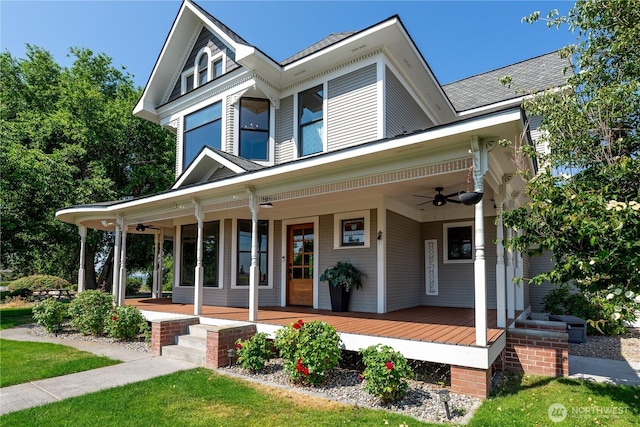 11801 Rd 5.6 NE, Moses Lake, WA 98837 - victorian home with a porch, a ceiling fan, and roof with shingles
