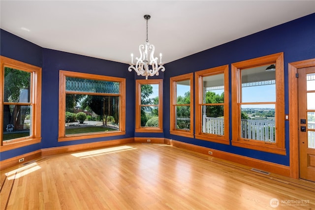 11801 Rd 5.6 NE, Moses Lake, WA 98837 - unfurnished room with a chandelier and wood finished floors