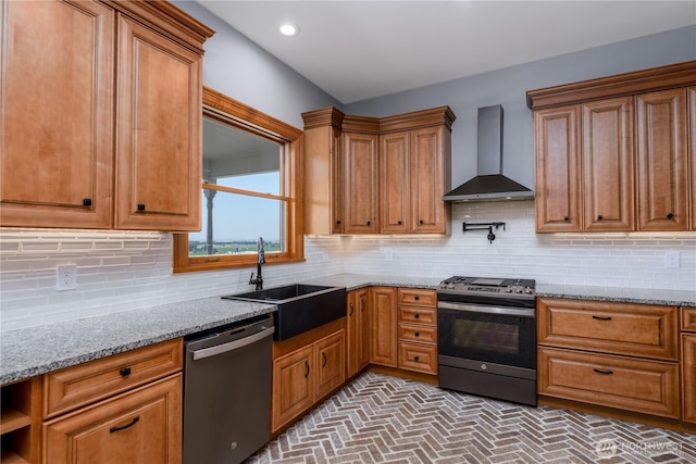 11801 Rd 5.6 NE, Moses Lake, WA 98837 - kitchen featuring stainless steel appliances, wall chimney range hood, brown cabinetry, light stone counters, and recessed lighting