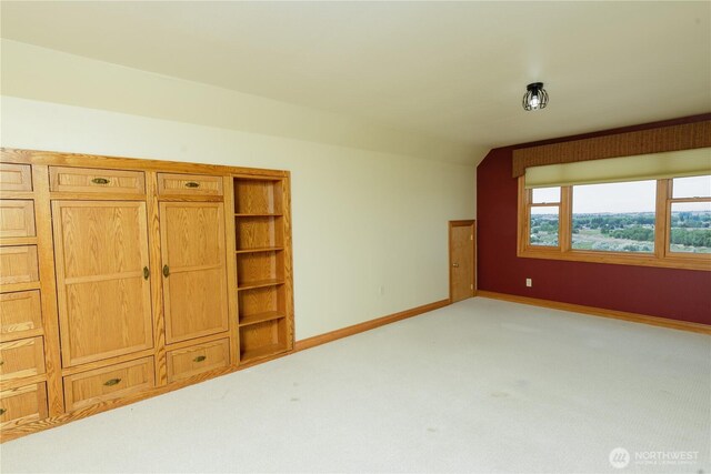 11801 Rd 5.6 NE, Moses Lake, WA 98837 - unfurnished bedroom featuring light carpet and lofted ceiling