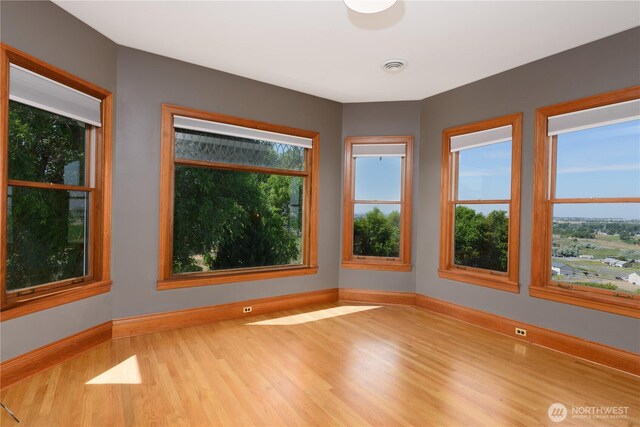 11801 Rd 5.6 NE, Moses Lake, WA 98837 - empty room featuring wood finished floors and baseboards