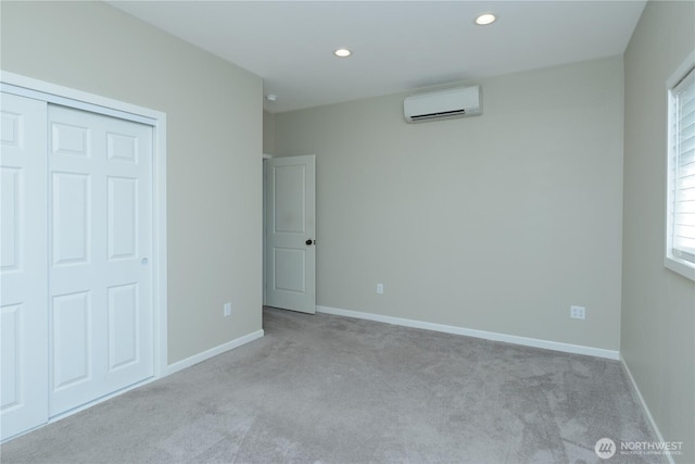 11801 Rd 5.6 NE, Moses Lake, WA 98837 - unfurnished bedroom featuring a wall mounted air conditioner, carpet, recessed lighting, and a closet