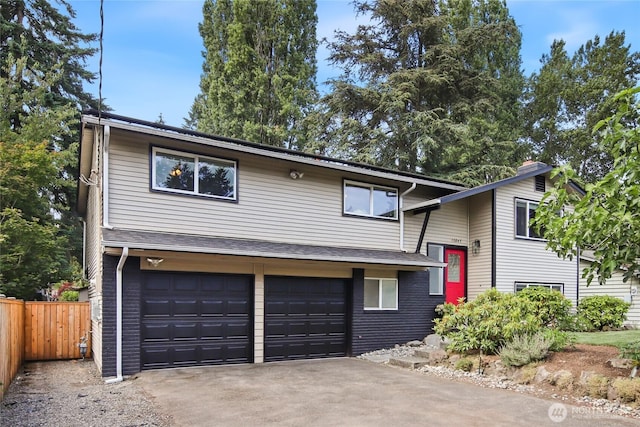 13045 28th Ave NE, Seattle, WA 98125 - split foyer home with a garage and concrete driveway