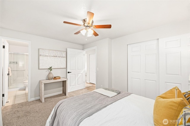 13045 28th Ave NE, Seattle, WA 98125 - bedroom featuring light colored carpet, a closet, ensuite bath, and ceiling fan