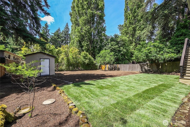 13045 28th Ave NE, Seattle, WA 98125 - fenced backyard featuring a shed and stairway