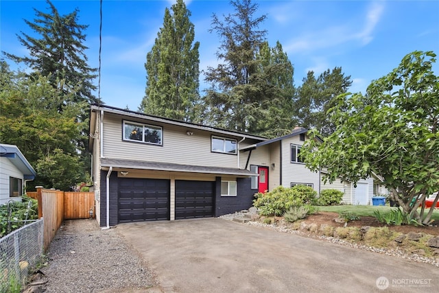 13045 28th Ave NE, Seattle, WA 98125 - bi-level home with driveway and an attached garage