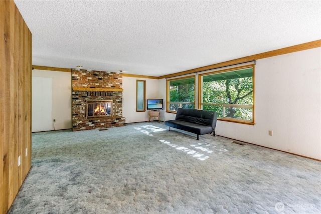 8419 121st St E, Puyallup, WA 98373 - living area with a textured ceiling, carpet flooring, and a fireplace
