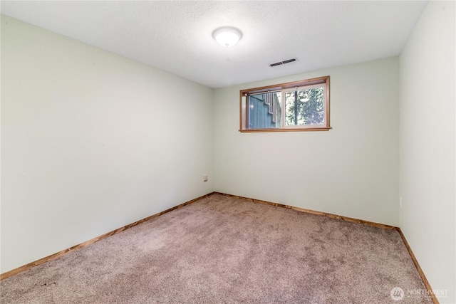 8419 121st St E, Puyallup, WA 98373 - unfurnished room featuring light carpet and a textured ceiling