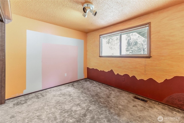 8419 121st St E, Puyallup, WA 98373 - unfurnished room featuring carpet and a textured ceiling