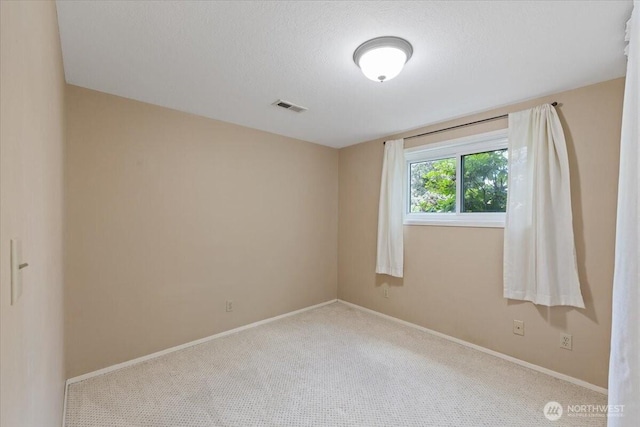 4128 S Lee St, Spokane, WA 99203 - carpeted spare room featuring baseboards