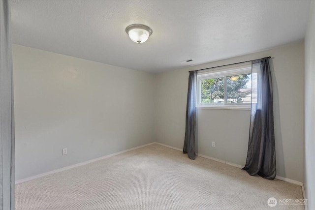 4128 S Lee St, Spokane, WA 99203 - spare room featuring carpet and a textured ceiling