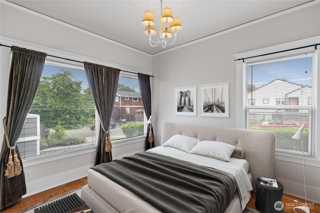 6903 Fauntleroy Way SW, Seattle, WA 98136 - bedroom with a chandelier, wood finished floors, and ornamental molding