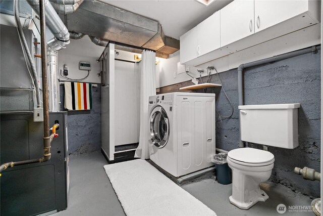 6903 Fauntleroy Way SW, Seattle, WA 98136 - laundry area with washer / clothes dryer and heating unit