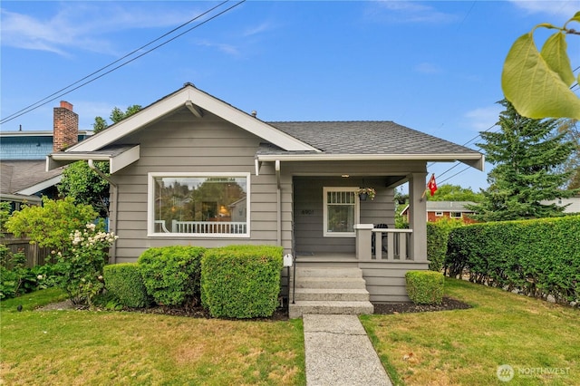 6903 Fauntleroy Way SW, Seattle, WA 98136 - bungalow-style home with a porch and roof with shingles