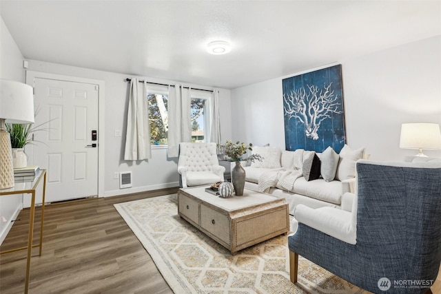 4715 S Cushman Ave, Tacoma, WA 98408 - living room featuring wood finished floors and baseboards